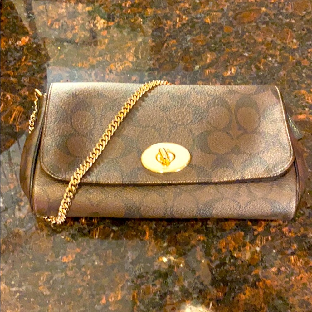COACH Brown-black monogram clutch